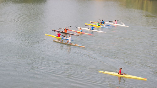 High angle view of people kayaking in river