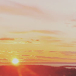 Scenic view of landscape against sky during sunset