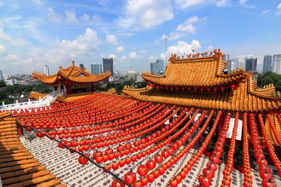 Panoramic shot of roof tiles against sky