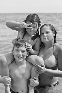 Portrait of mother and daughter in water