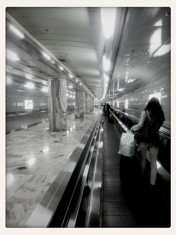 indoors, transportation, lifestyles, illuminated, men, escalator, railroad station platform, ceiling, railroad station, public transportation, subway station, passenger, person, subway, architecture, walking, transfer print, modern, rail transportation