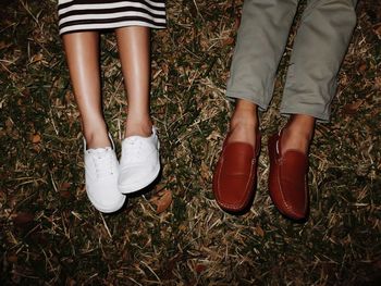 Low section of people standing on ground