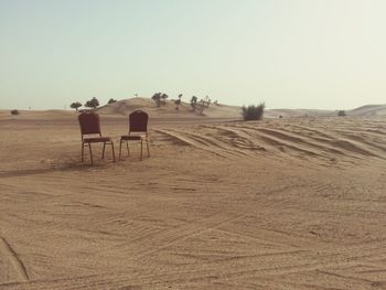 Scenic view of desert against clear sky