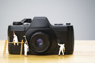 Close-up of camera on table