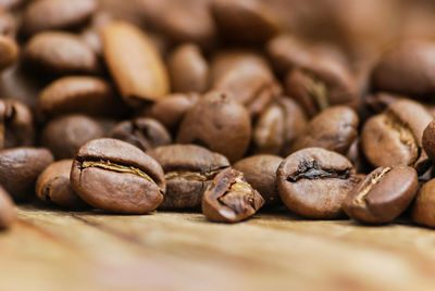 Close-up of coffee beans on table