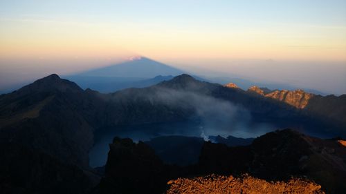 Scenic view of mountains against sky during sunset
