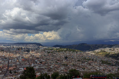 Aerial view of townscape against sky