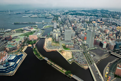 High angle view of buildings against sky in city
