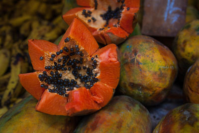 Close-up of papayas for sale at market stall