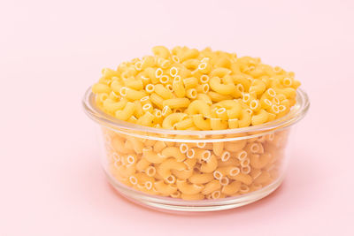 Close-up of food in container against white background
