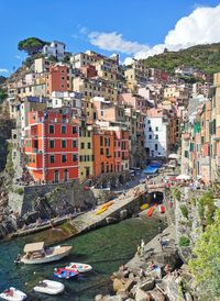 High angle view of buildings in city against sky