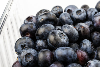 High angle view of blueberries in container