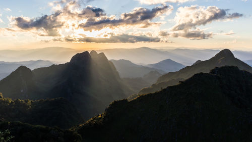 Scenic view of mountains against sky during sunset