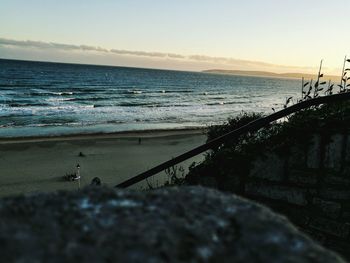 View of calm beach against sky