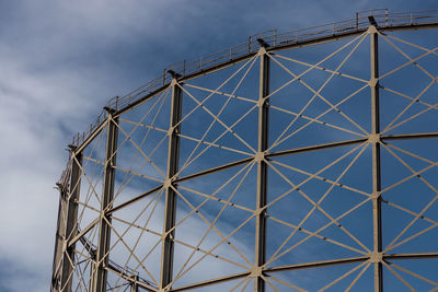 Low angle view of metallic structure against sky