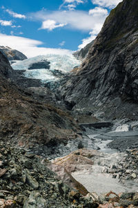 Scenic view of mountains and glacier at franz josef  new zealand