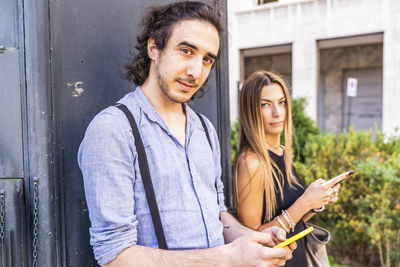 Young man using smart phone