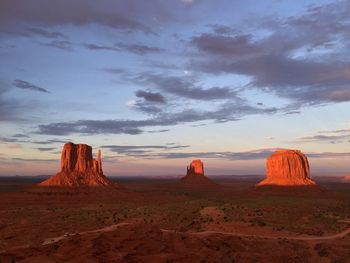 Idyllic shot of monument valley against sky during sunset