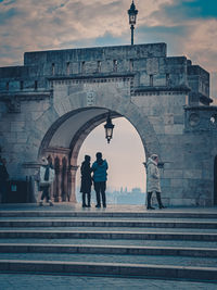 People at historic building