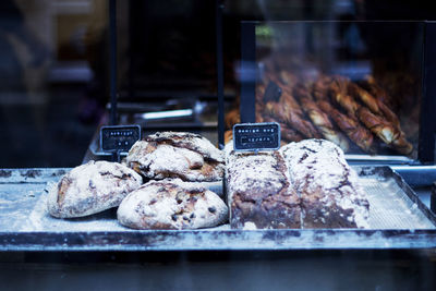 Close-up of backed food at market stall