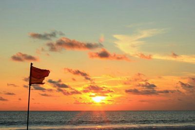 Scenic view of sea at sunset