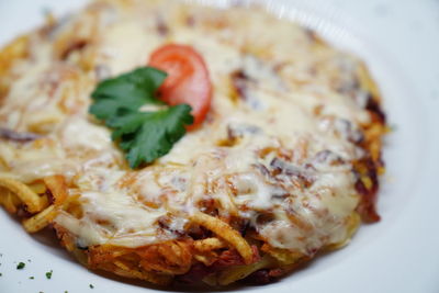 Close-up of pizza served in plate