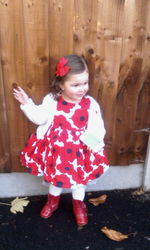 Full length of cute girl standing on wood