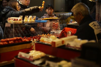 High angle view of people on table