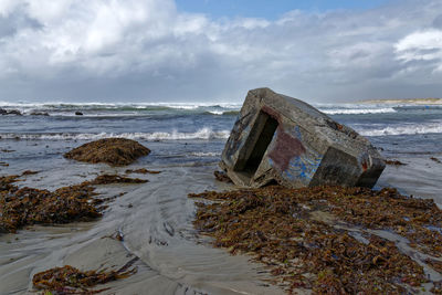 Scenic view of beach against sky