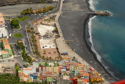 High angle view of cityscape by sea