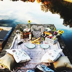 High angle view of food on table against lake