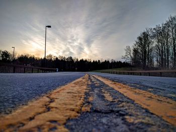 Empty road at sunset