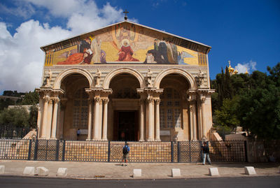 Facade of historic building against sky