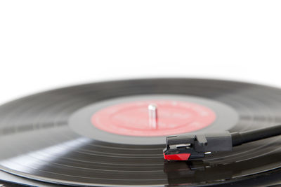 Close-up of turntable against white background