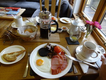 High angle view of breakfast served on table