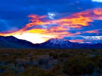 Scenic view of mountains against sky during sunset