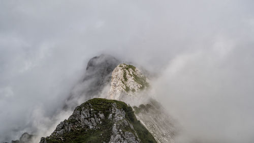 Scenic view of volcanic mountain against sky