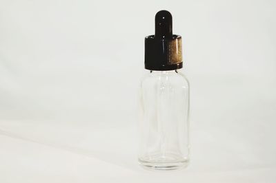 Close-up of water bottle against white background