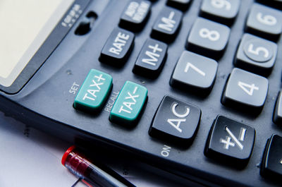 Close-up of calculator on table