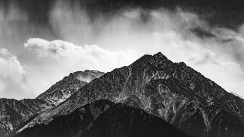 Low angle view of mountains against sky