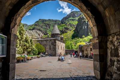 People at historical building