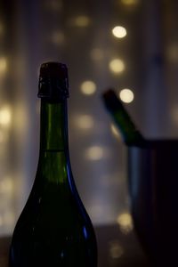 Close-up of beer bottle on table