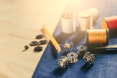 High angle view of various buttons on table