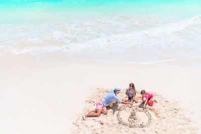 People enjoying at beach