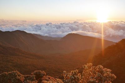 Scenic view of mountains against sky during sunset