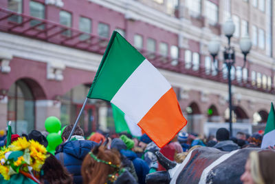 Man with irish flag in crowd