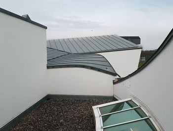 Low angle view of modern building against sky