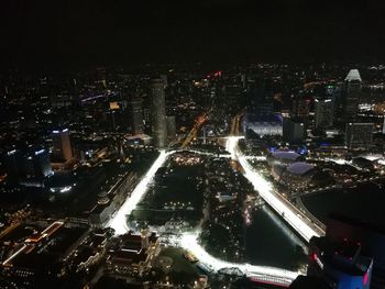 Aerial view of illuminated cityscape at night