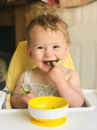 Portrait of cute boy eating food