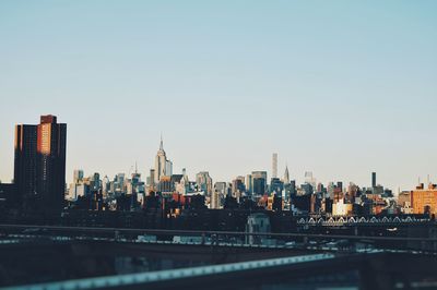 View of city skyline against clear sky